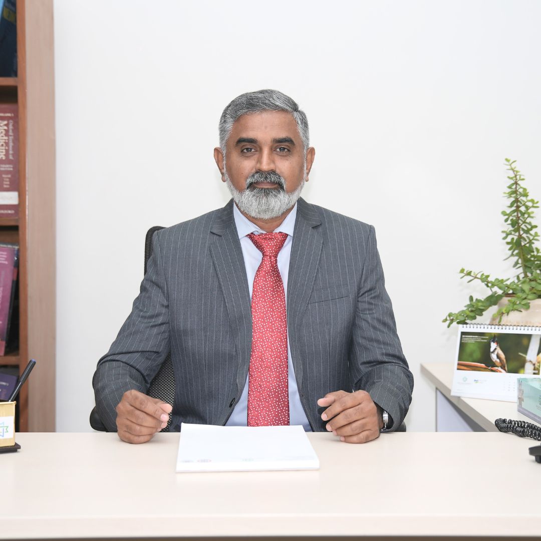 Dr. Purushothama K R